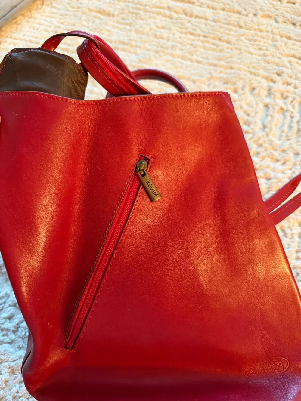Kevim red leather backpack